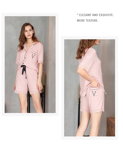 Detail of pink lounge set with lace trim and elegant V embroidery on the pocket