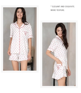 Detail of modal pajama set with red heart print, lapel top and ruffled shorts