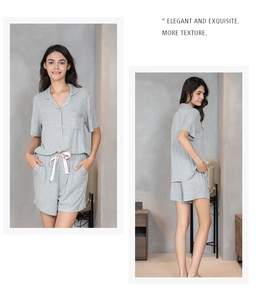Close-up of light gray ribbed summer pajama set with pink ribbon bow detail on shorts