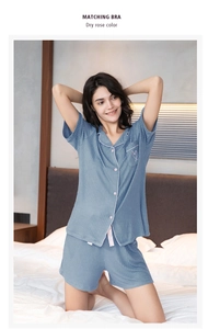 Close-up of ribbed texture and pink heart embroidery on women's grey-blue pajama set