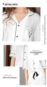 Detail view of white striped modal pajama set with black trim and v-letter embroidery