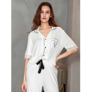 Women's white modal pajama set with lace short sleeves and ribbed texture loungewear