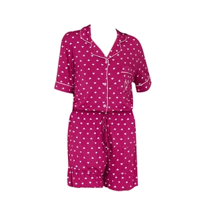 Women's heart print modal pajama set with short sleeve button-down top and ruffle shorts