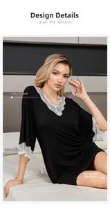 Detailed view of sexy V-neckline with lace patchwork and hem on black modal nightgown