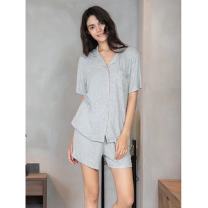 Women's grey ribbed modal pajama set with short sleeves and pink piping trim
