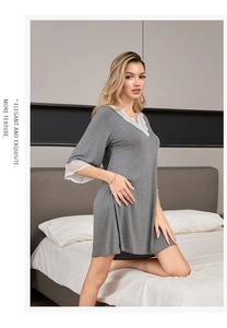 Detailed view of grey modal sleepwear dress with white lace V-neck and mid-sleeves