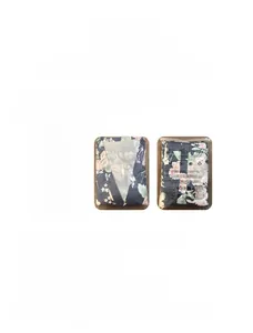 Detail of floral print fabric pajamas with focus on material tag and packaging quality