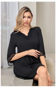 Close-up of elegant black lace trim on V-neck modal nightdress for women