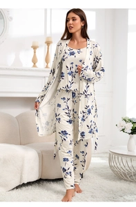 Three-piece floral knit pajamas set with open robe and tank top in a modern home setting