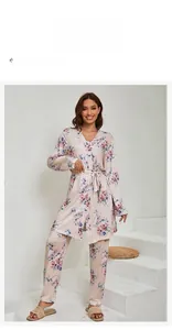 Detail view of pink floral pajama set with wrap top and matching long pants
