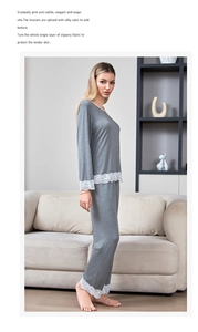 Detailed view of delicate white lace trim on grey modal cotton long sleeve pajama set