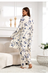 Three-piece floral pajama set with robe and trousers in high-quality cozy home setting