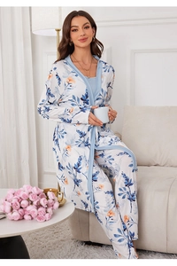 Detail of floral 3-piece pajama set featuring a tie-waist robe and matching floral print pants