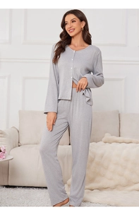 Detail of grey knitted cotton pajama set with long sleeves and buttons for loungewear