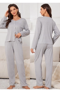 Detailed view of light gray knitted cotton pajamas set with button-up top and long pants