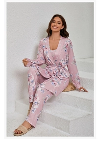Detailed view of women's soft floral pink sleepwear robe and matching long trousers