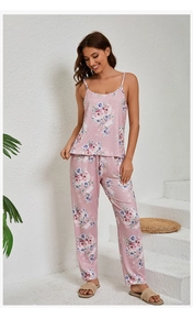 Detail of floral printed pajama set featuring spaghetti strap top and matching trousers