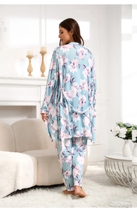 Rear view of light blue floral loungewear set featuring long robe and matching pants