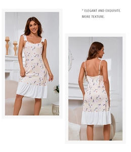 Détail d'une chemise de nuit fleurie à bretelles avec ourlet à volants blancs et bordure