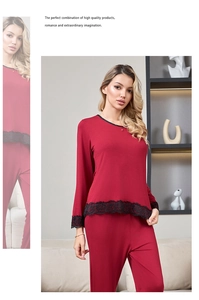 Detailed close-up of delicate rose pattern lace trim on burgundy modal cotton pajama set