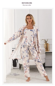 Detailed view of dry rose three-piece pajama set featuring floral robe and camisole