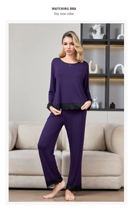 Detailed view of dark rose pajama set with elegant black lace trim on sleeves and hem
