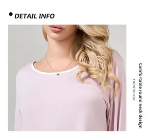 Detailed view of the round neckline with white piping on the modal cotton pajama top