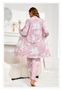 Back view of a pink floral cotton pajama set featuring a belted robe and long trousers