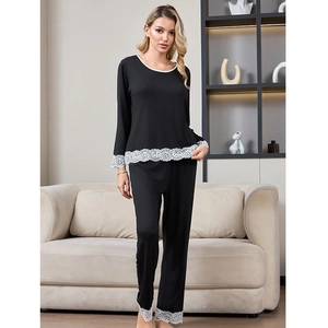 Black modal cotton pajamas set with lace trim and long sleeves for a minimalist home look