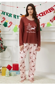 Women's Christmas pajama set detail with Merry Christmas print and festive deer patterns