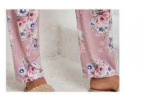 Detail of pink floral pajamas pants with reinforced hem and comfortable cotton fabric