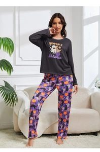 Close-up of Halloween pajama set with Spooky Season print and ghost pattern pants