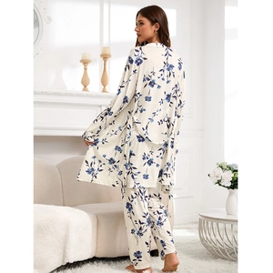 Plus size women's cotton floral pajama set with tie robe and long pants in cream and blue