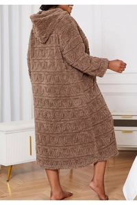 Close-up of brown hooded plush robe featuring embossed geometric triangle texture detail
