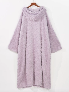 Macro detail of lavender oversized hoodie robe with embossed diamond pattern and plush fleece