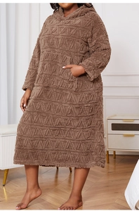 Close-up of plush dark brown oversized hoodie dress with geometric triangle texture