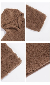 Detailed view of dark brown fleece hoodie with geometric texture and elastic cuffs