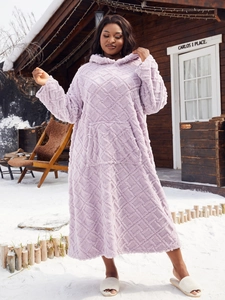 Close-up of lavender fleece hooded robe with diamond pattern texture in snow scene