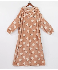 Detail of soft fleece fabric with white stars on a light brown hooded bathrobe