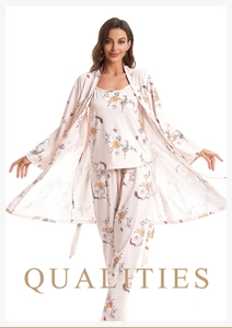 Detail view of pink floral pajama set featuring tank top, pants, and belted robe