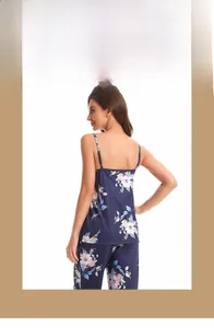 Detailed back view of women's navy floral pajama set with thin straps and pants