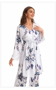 Detail of three-piece cotton floral pajama set with kimono wrap and matching trousers