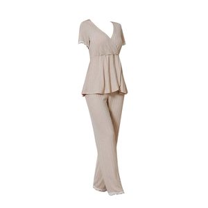 Women's V-neck loungewear set in beige ribbed knit with delicate white lace trim
