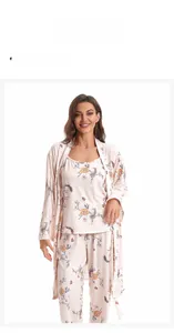 Three-piece women pajama set with floral bird print featuring robe, top and pants