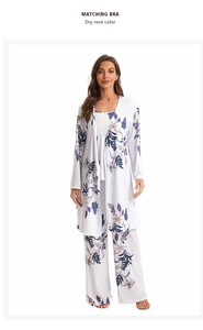Detailed close-up of matching floral three-piece loungewear set with printed matching bra