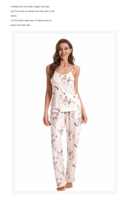 Close-up of women's silk pajamas set featuring floral patterns and a camisole top