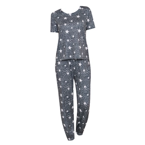 Women's pajama set featuring short sleeve top and joggers with white star print pattern