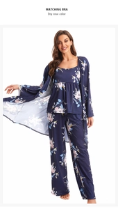 Detail view of navy blue floral 3-piece pajama set including camisole, pants and robe