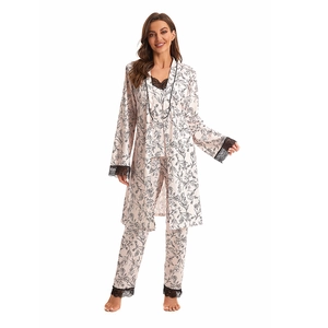 Three-piece floral satin pajama set with lace trim includes robe, camisole and pants
