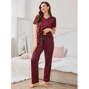 Women's burgundy knit lounge set with short sleeve top and bow-tie long pants